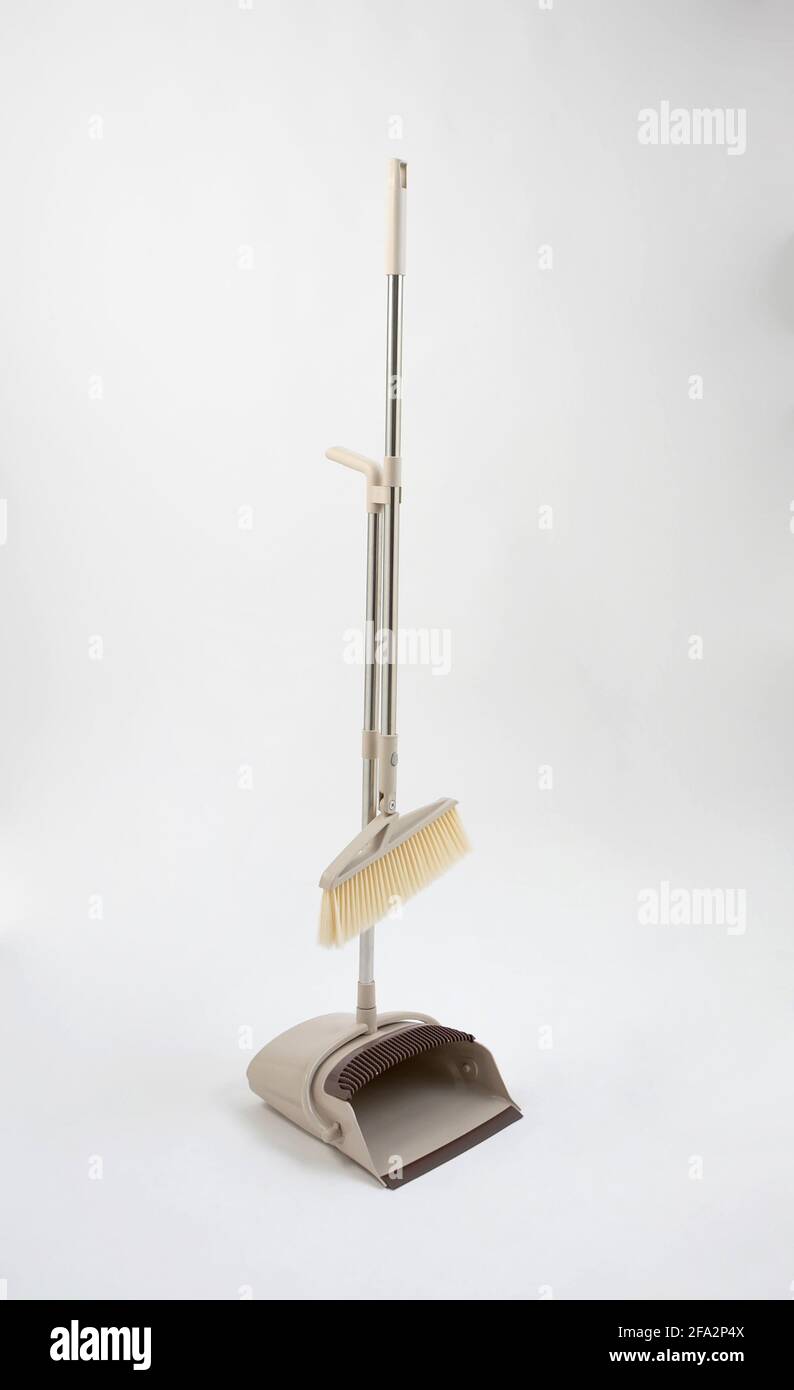 new broom and dustpan isolated on white background Stock Photo