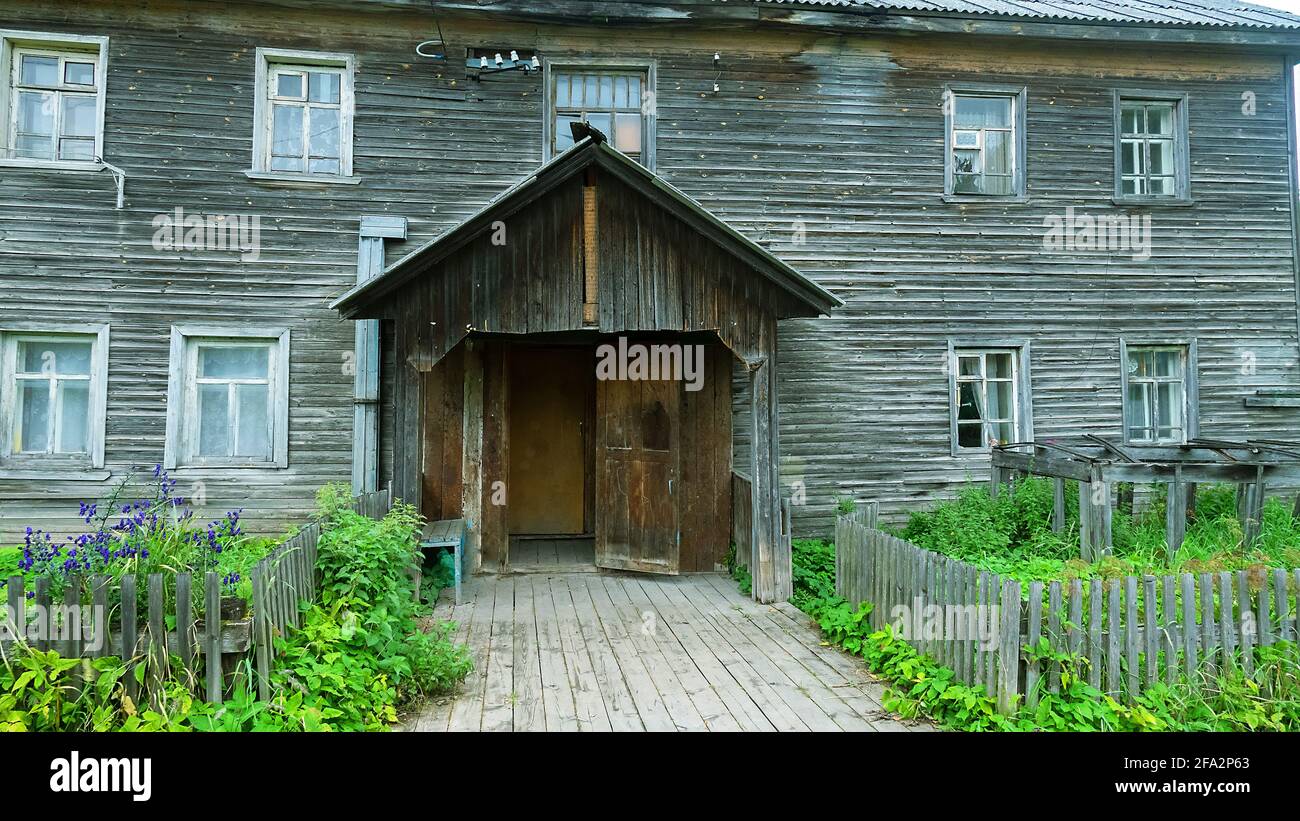 Old Russian wooden houses in the village and provincial town of Arkhangelsk near-polar regions Stock Photo