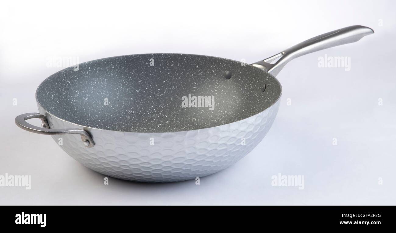 Empty frying metal pan isolated on white background Stock Photo