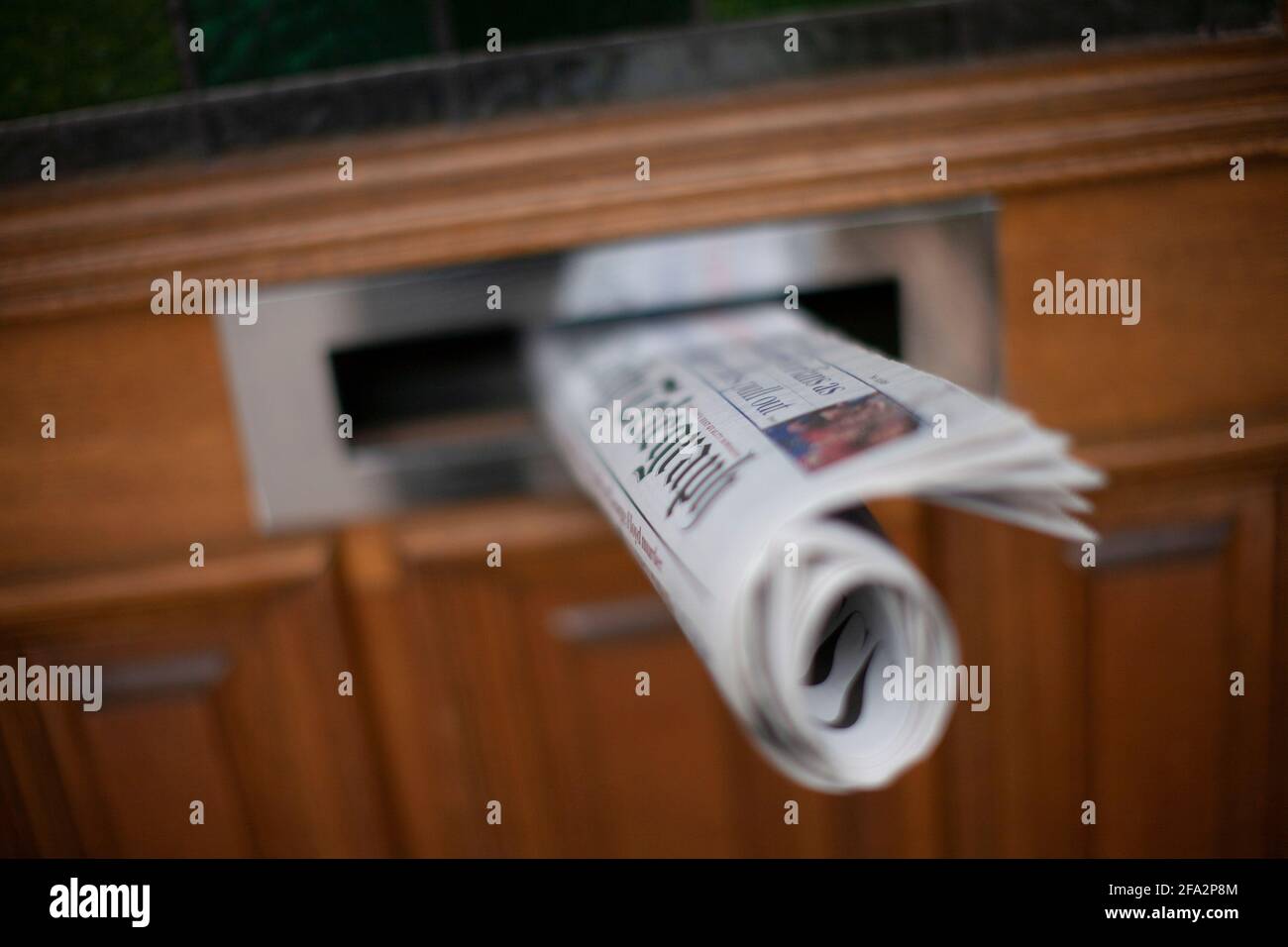 The Daily Telegraph British Daily newspaper Daily newspaper in front door  letterbox Stock Photo