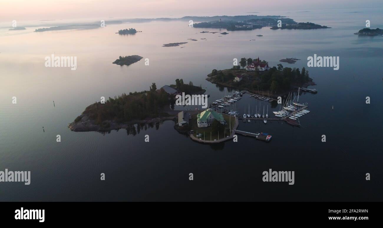 HELSINKI, FINLAND - Aug 28, 2019: Luoto and Valkosaari islands, Aerial drone shot of restaurants and buildings, in the Helsinki archipelago, sunrise, Stock Photo