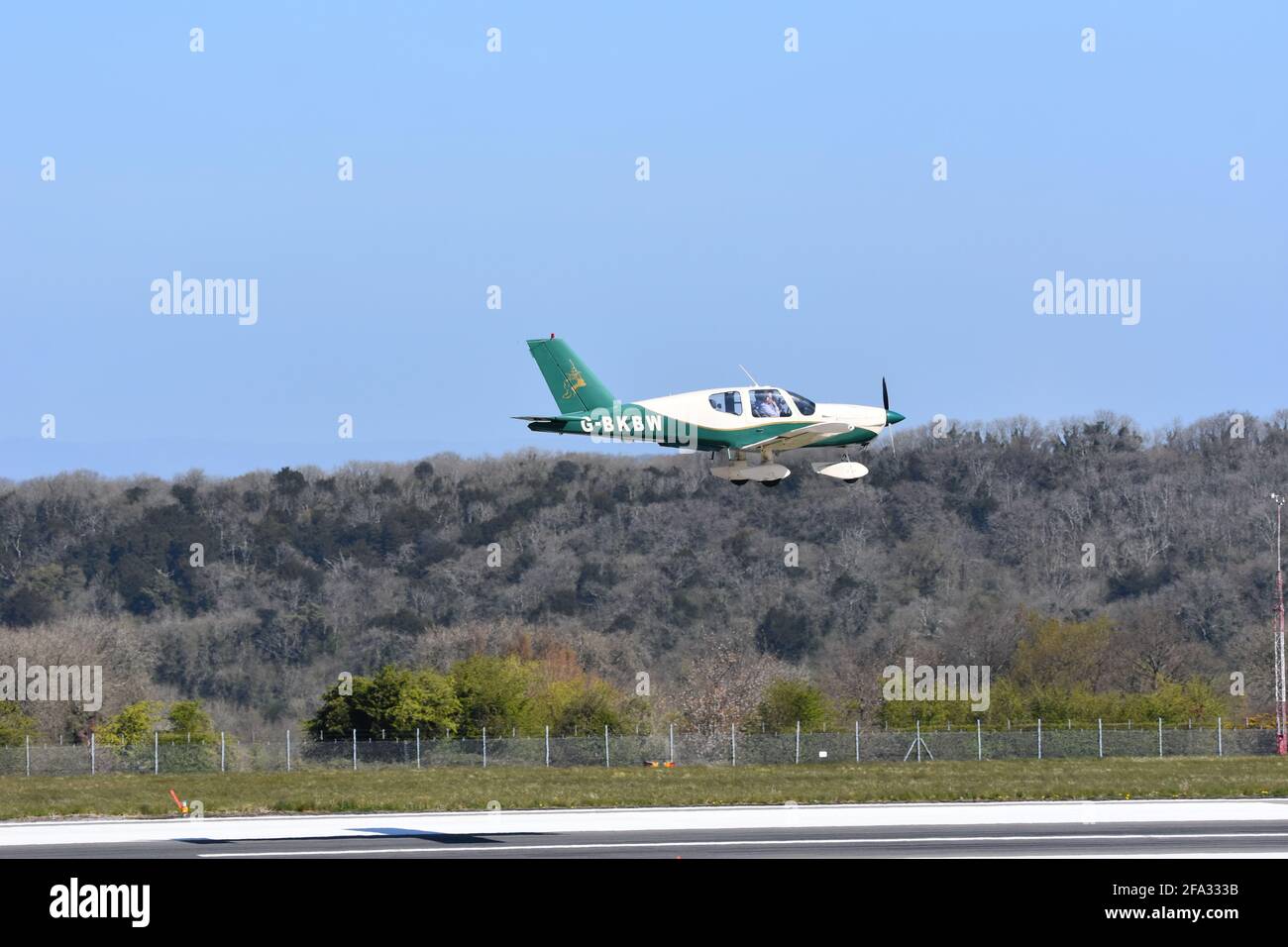 A small light aircraft coming into land at Lulsgate Airport, Bristol, England, UK Stock Photo