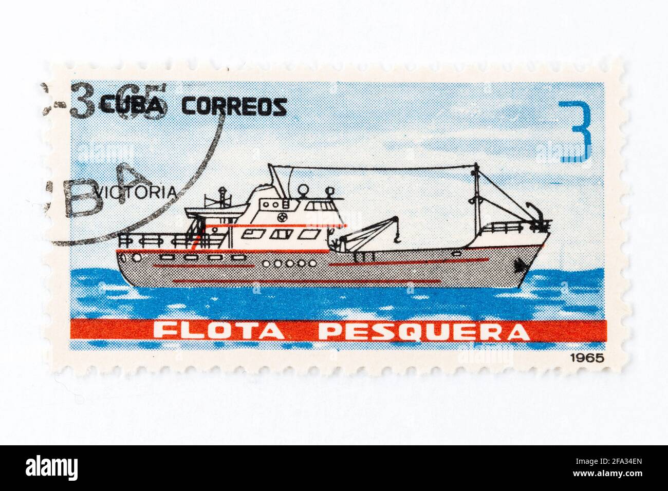 'Cuba Correos' antique postage stamp themed in the fishing fleet of the country. Date of emission 1965. Ship named 'Victoria' Stock Photo