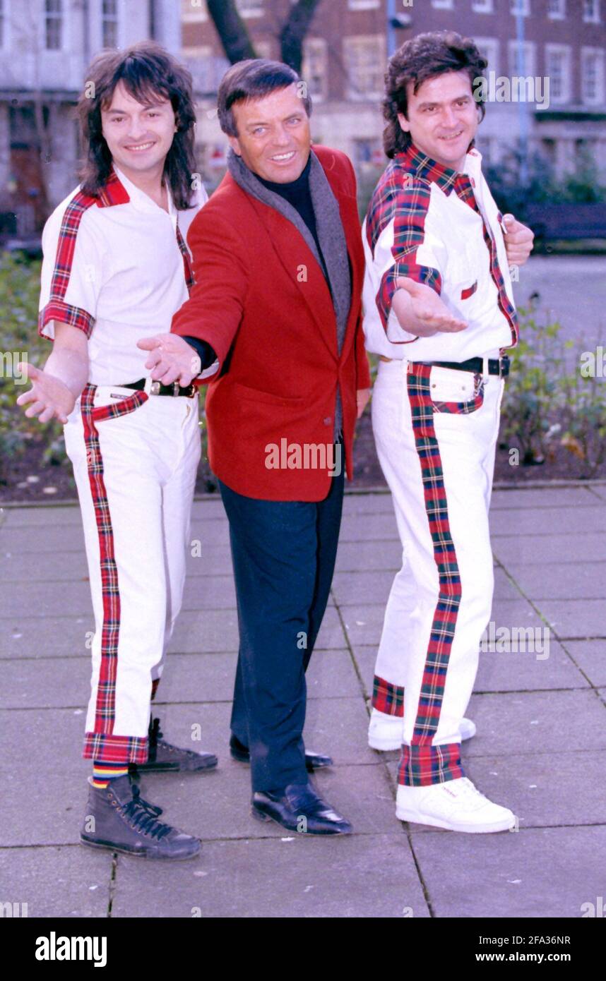 File photo dated 21/12/92 of Tony Blackburn with Bay City Rollers Ian  Mitchell and Leslie Mckeown (Right) at the launch of the BBC2 series,  Sounds of the Seventies. Bay City Rollers singer