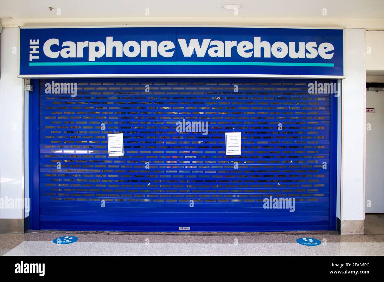 The Carphone Warehouse close shops with shutters down Stock Photo