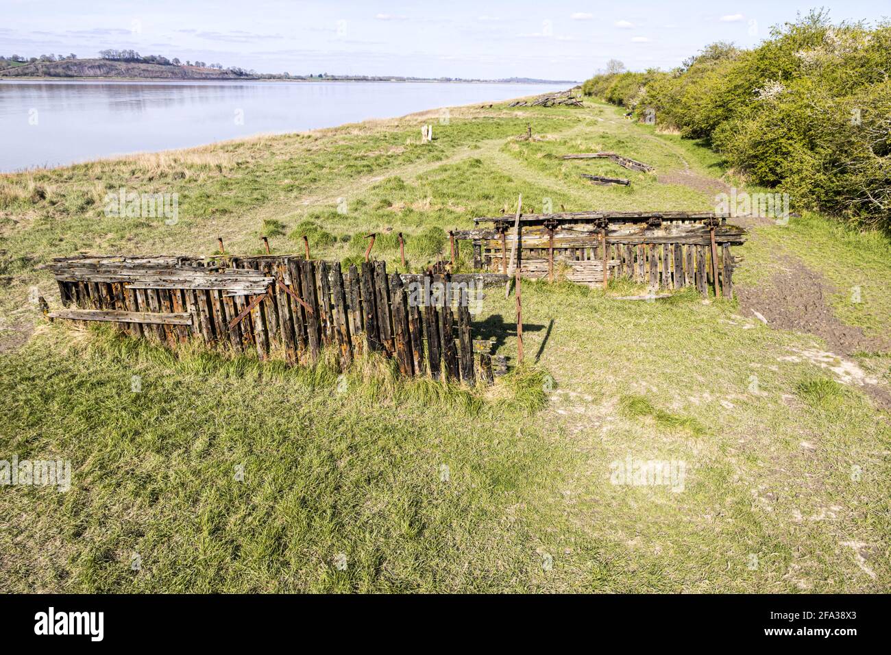 The remains of the schooner Ada, one of many such vessels deliberately beached on the banks of the River Severn to prevent erosion at The Purton Hulks Stock Photo