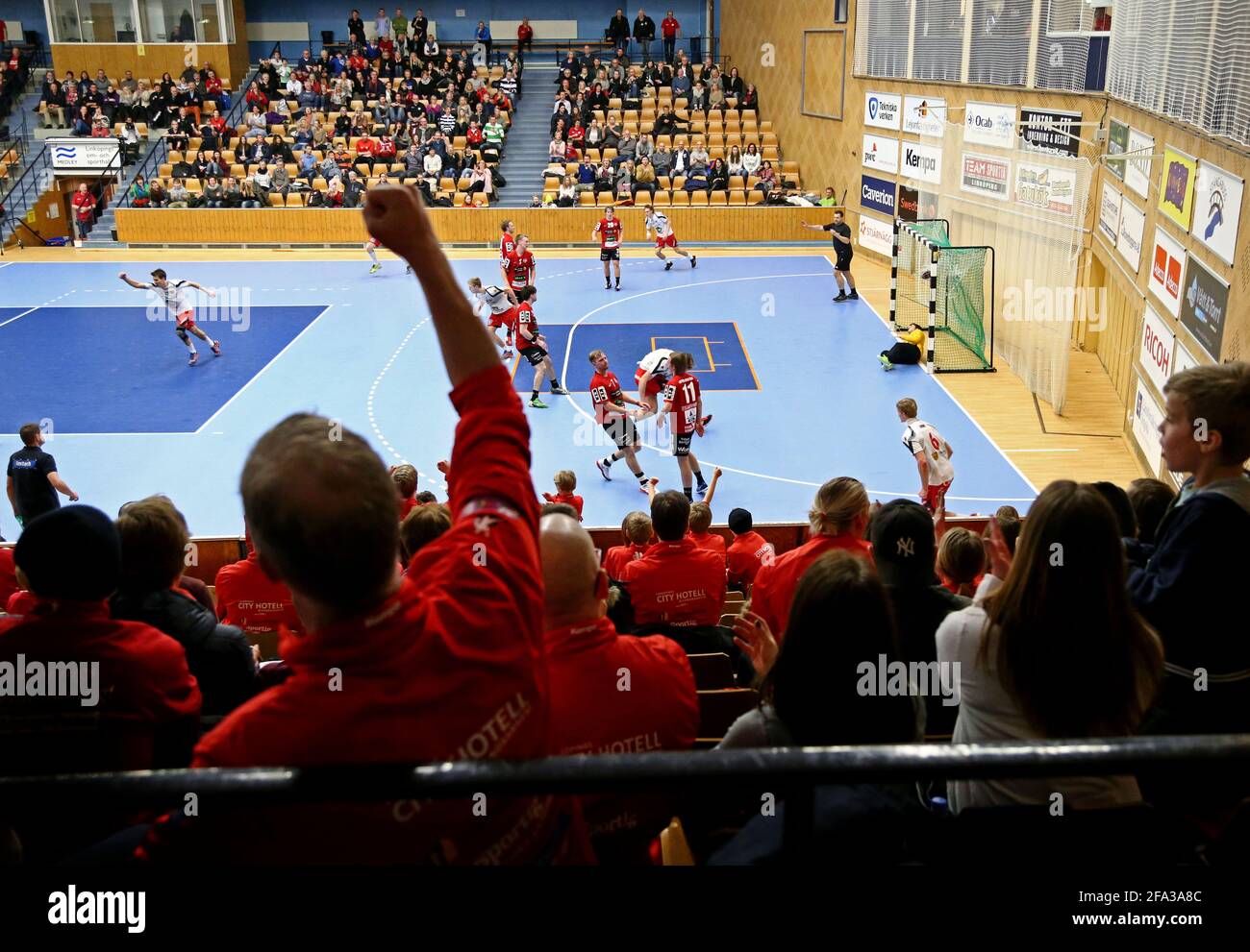 Handball match in a sports hall Stock Photo Alamy