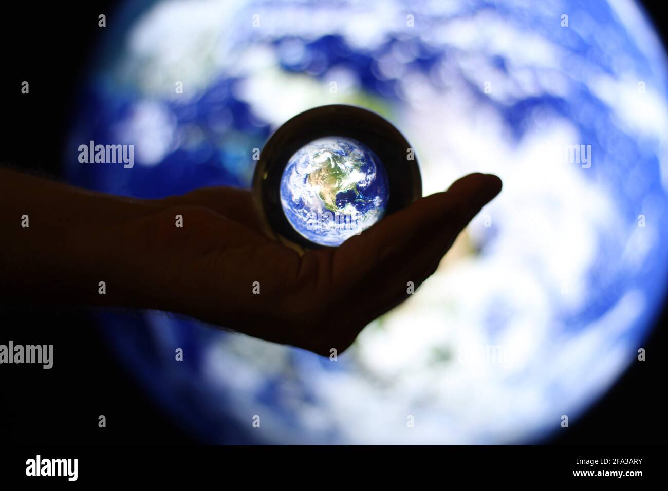 The survival of the earth is in our hands Stock Photo
