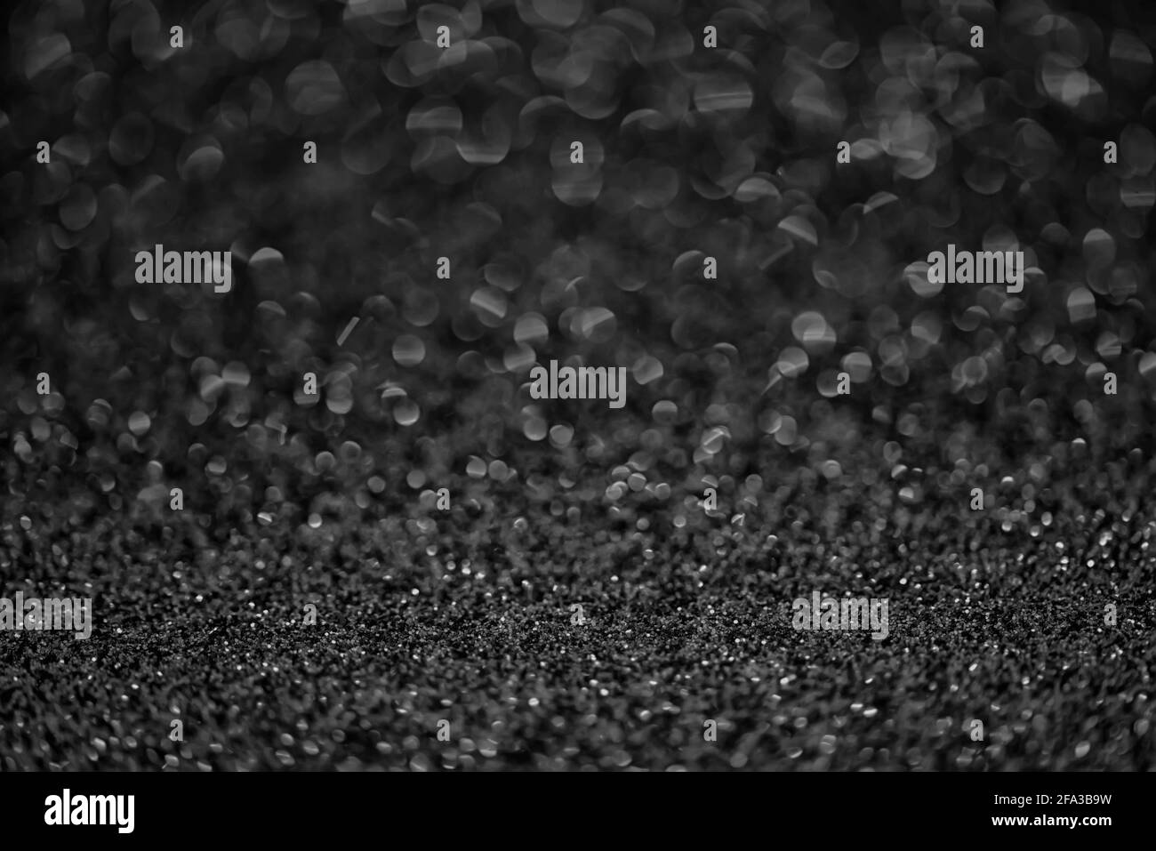 Abstract background glitter snow on black surface Stock Photo - Alamy