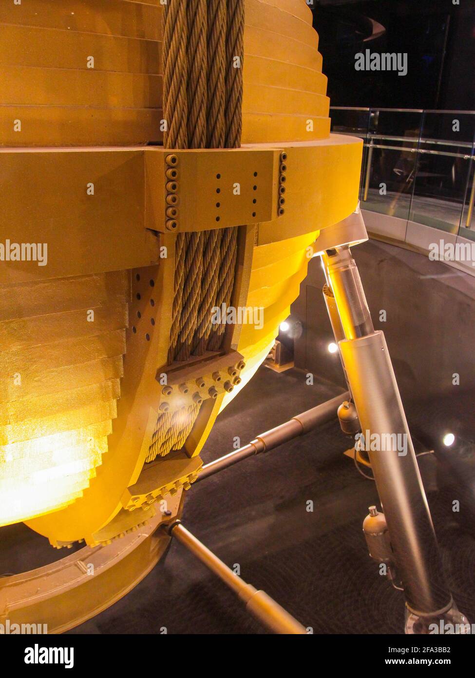 A detail of the big gold painted steel plate sway damper cables and struts. In Taipei, Taiwan. Stock Photo