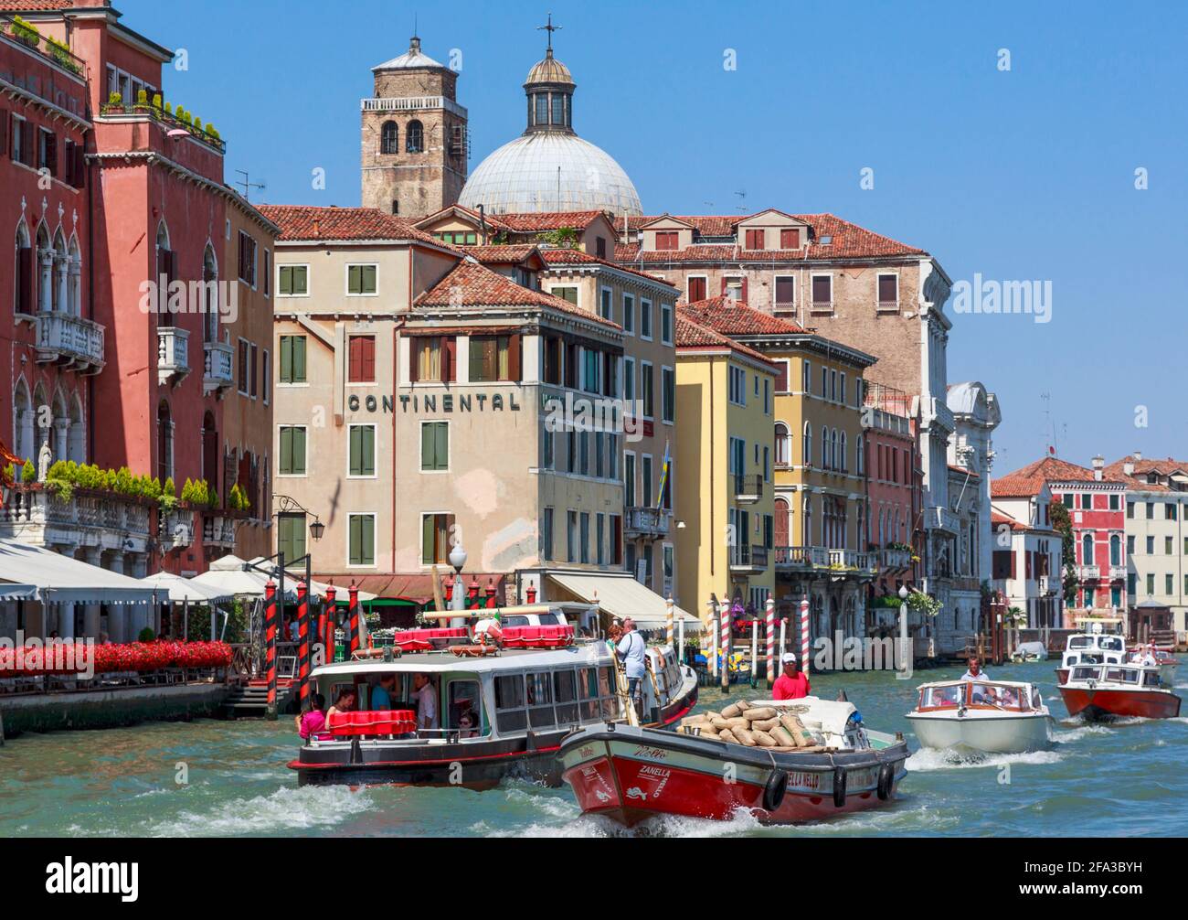 Venice, Venice Province, Veneto Region, Italy.  Typical scene on the Grand Canal. Venice and its lagoon are a UNESCO World Heritage Site. Stock Photo