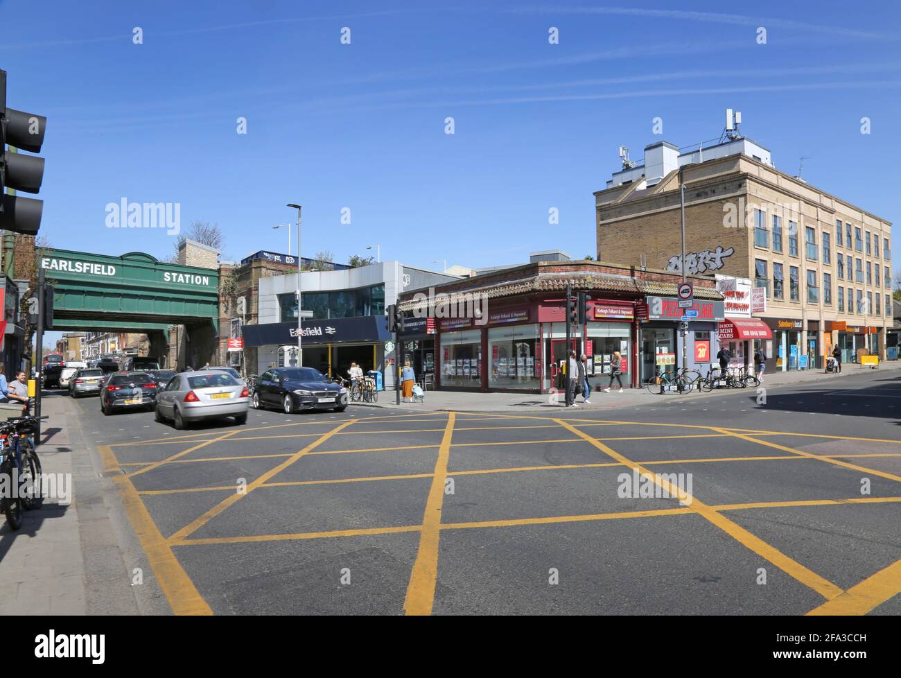 Earlsfield town centre, southwest London, UK. Shows station and junction of Garratt Lane and Magdalen Road, Stock Photo