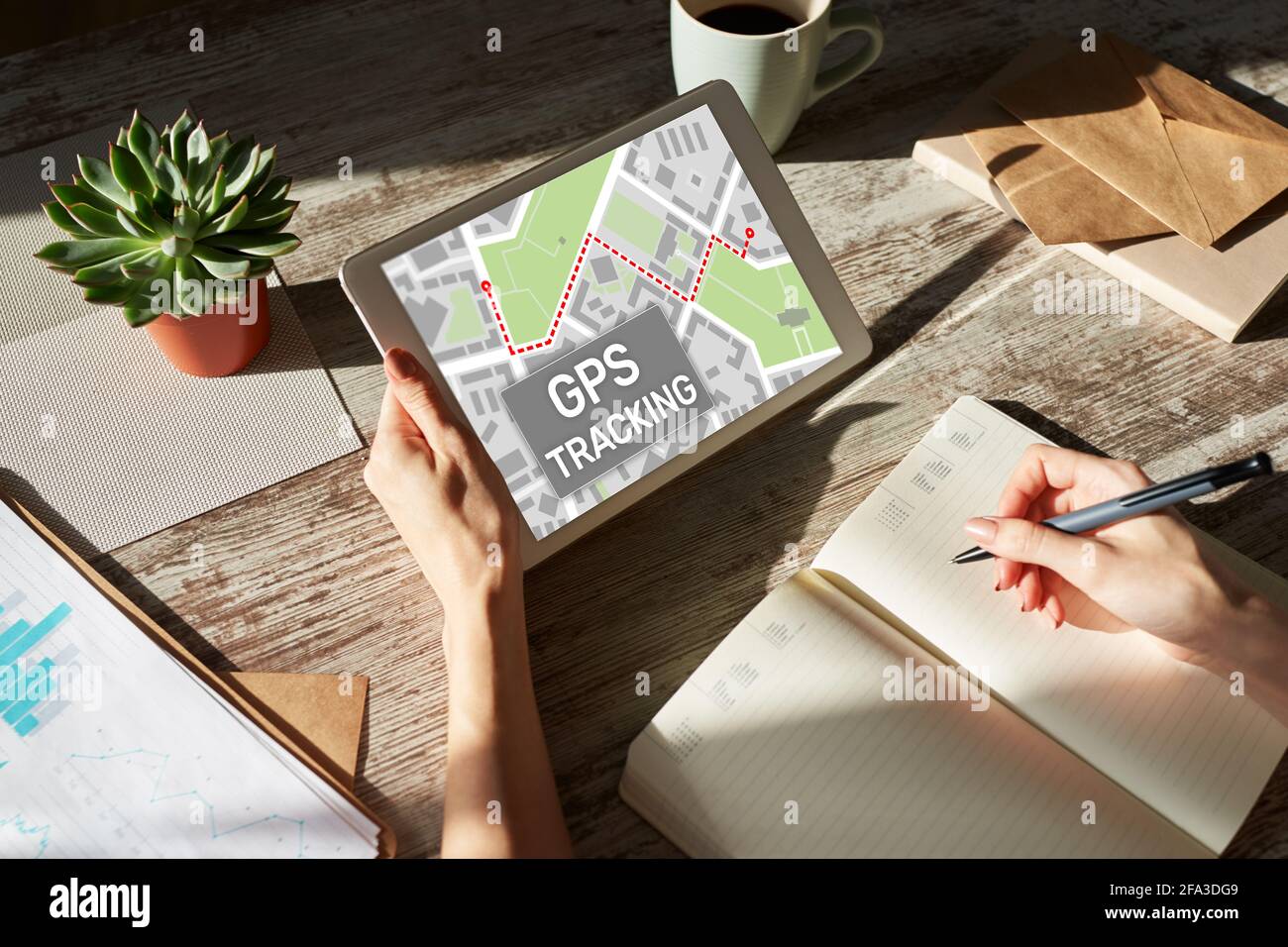 GPS Global positioning system tracking map on device screen Stock Photo