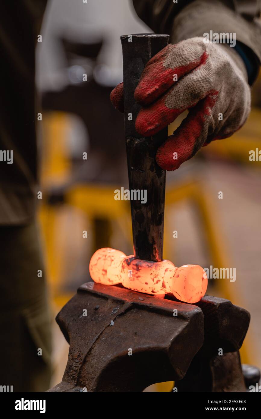 Traditional metalworking process in a Closeup of processing a