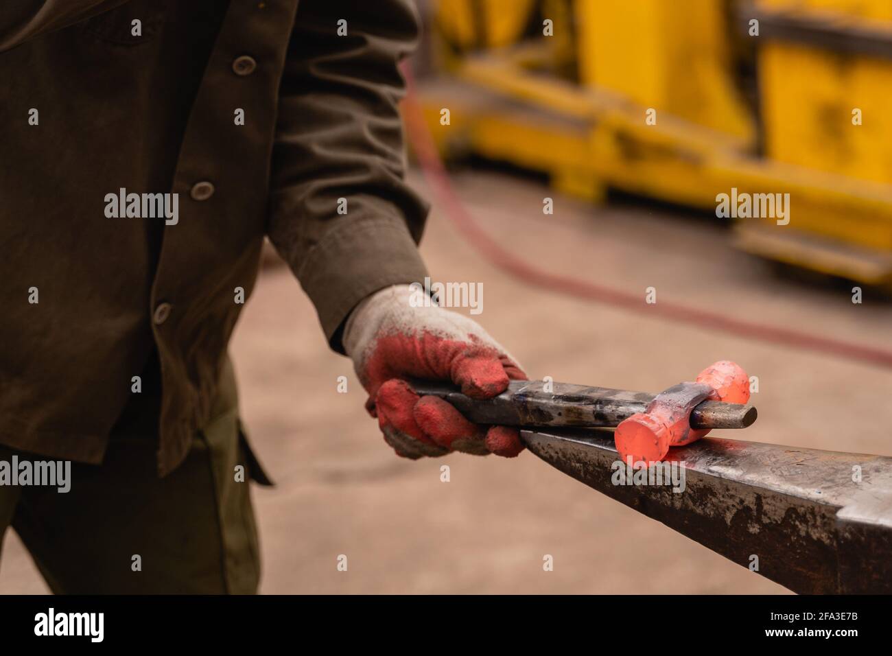Traditional metalworking process in a Closeup of processing a