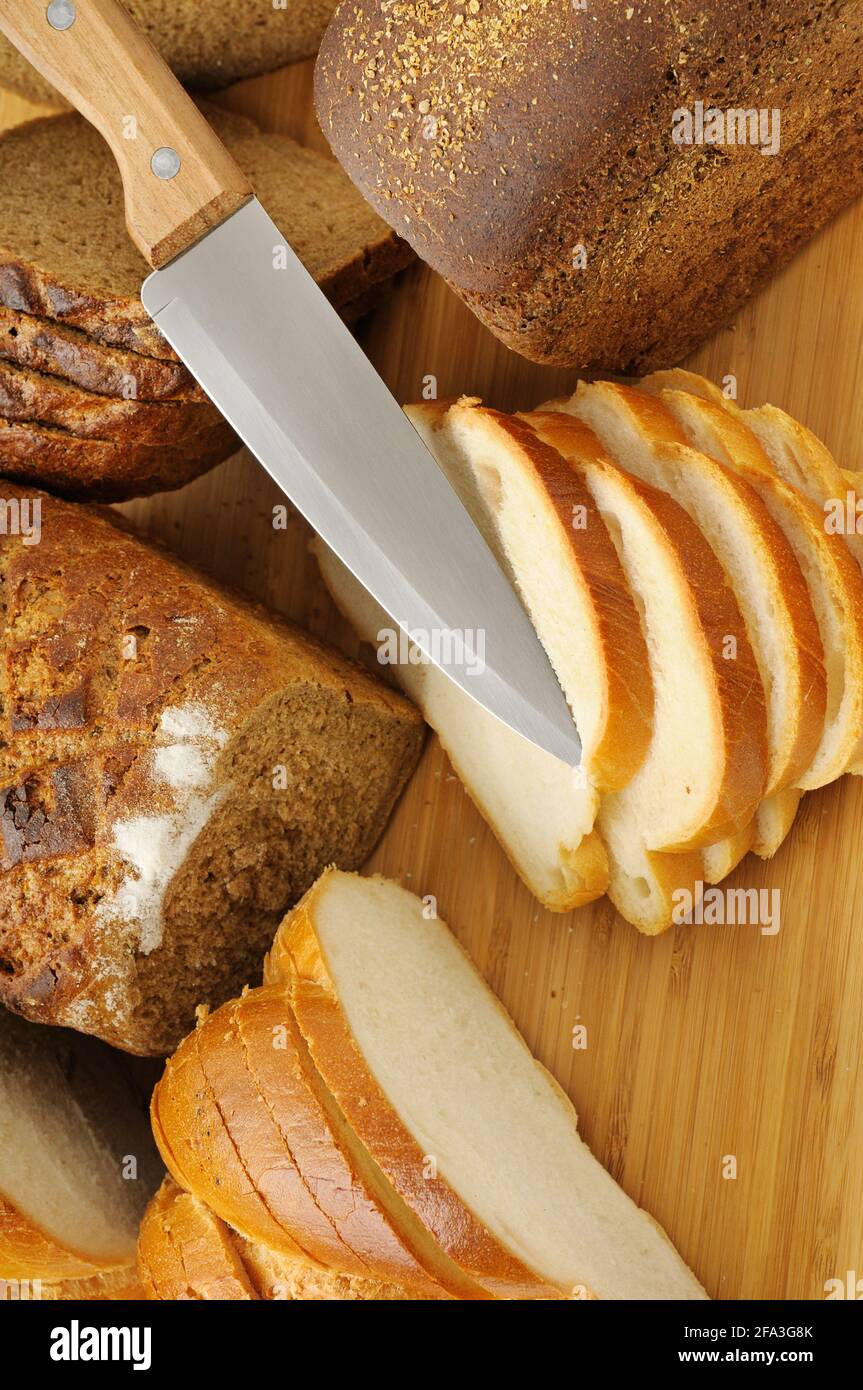 cut bread and knife Stock Photo