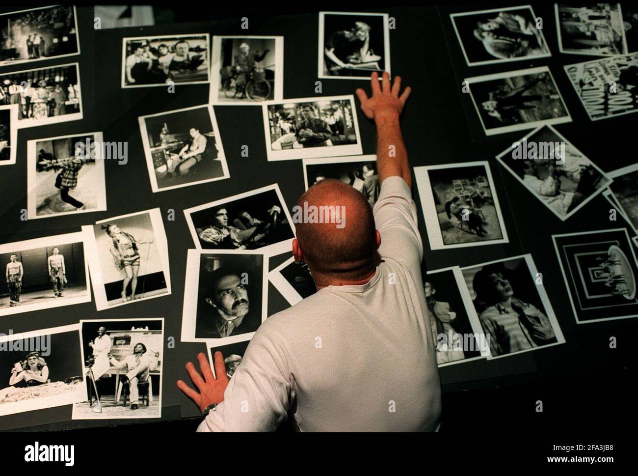 ROYAL COURT THEATRE  Greg Piggot laying out photographs for an exhibition of Royal Court History9th September 1996 Stock Photo