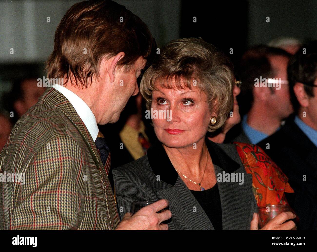 Angela Ripon with Henry Kelly October 1998 at the offices of LBC Radio Station to celebrate  25 years of Commercial Radio Stock Photo