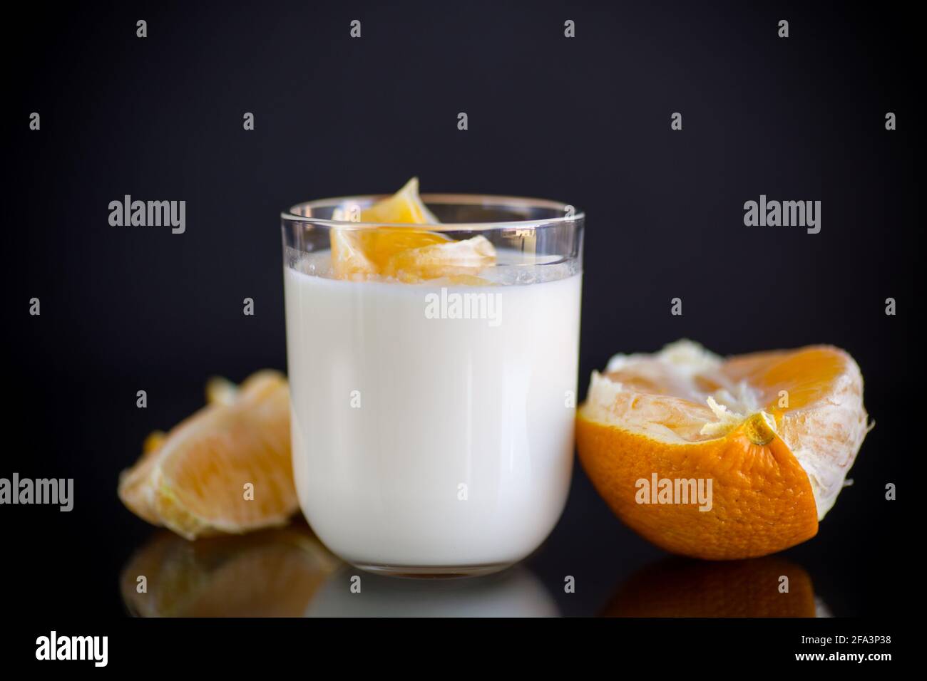 homemade sweet yogurt in a glass with oranges Stock Photo Alamy