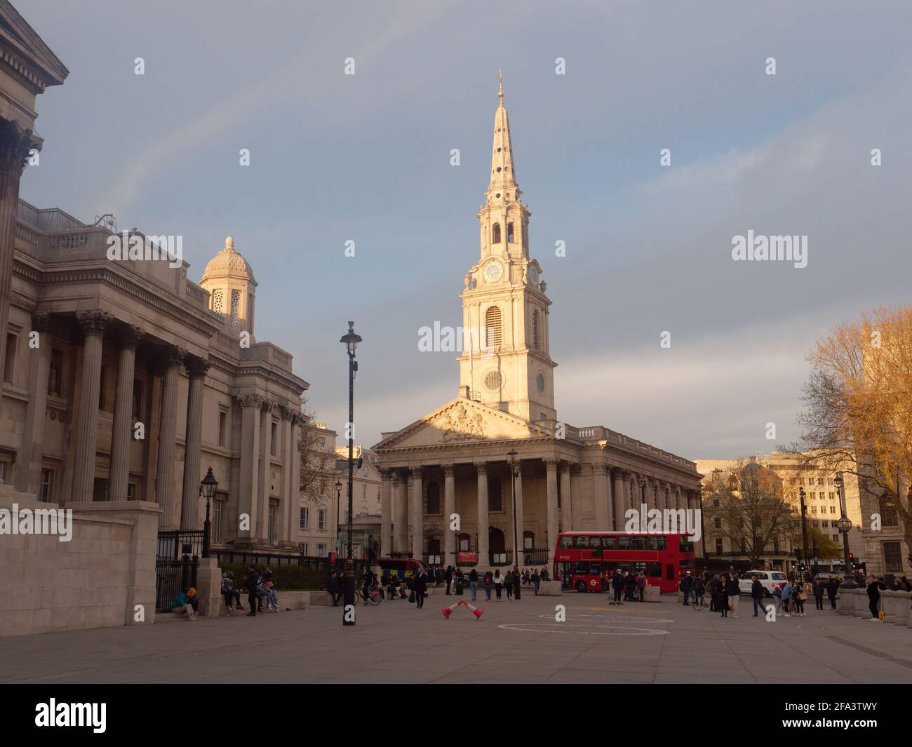 London, Greater London, England - Apr 17 2021: Trafalgar Sq with St Martin in the Fields Church middle and National Gallery left. Stock Photo