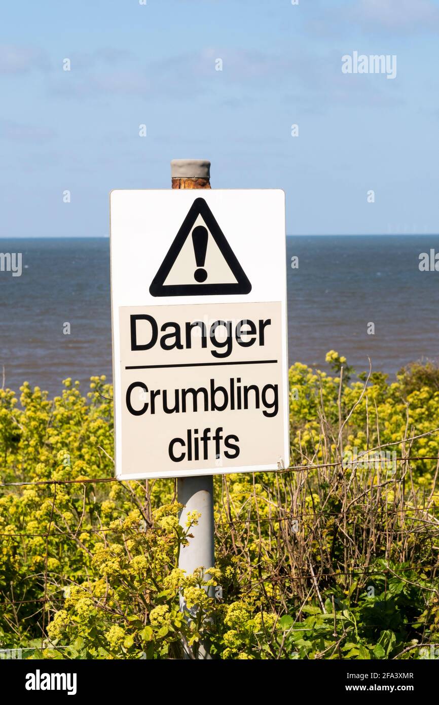 Danger Crumbling Cliffs warning sign at Old Hunstanton in Norfolk. Stock Photo