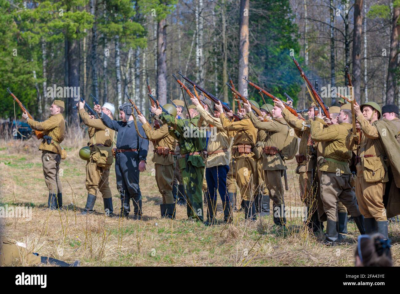 Reconstruction of the Second World War. Russian soldiers celebrate the victory, a volley of rifles upwards. The Great Patriotic War. Liberation of Ode Stock Photo