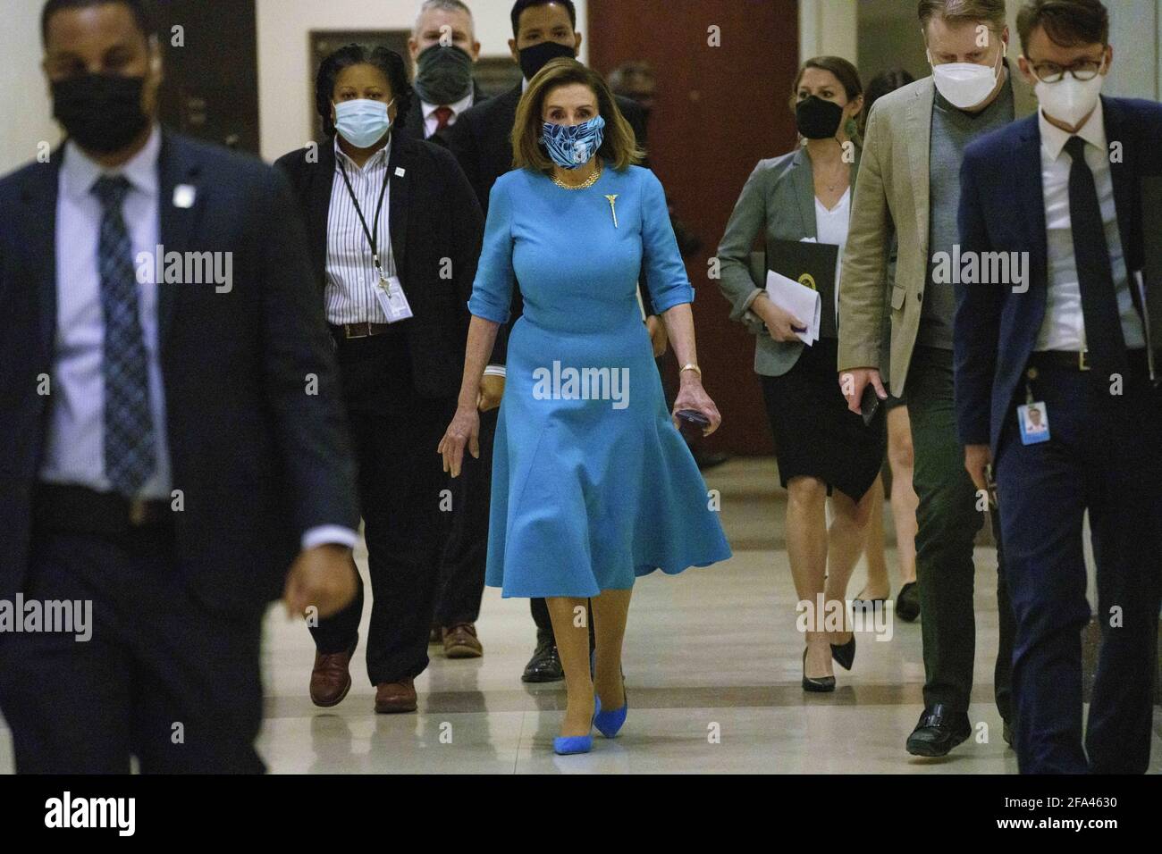 Washington, USA. 22nd Apr, 2021. U.S. House Speaker Nancy Pelosi (C) arrives for a press conference on Capitol Hill in Washington, DC, the United States, April 22, 2021. The U.S. House on Thursday voted to pass a bill that would make Washington, DC the nation's 51st state, a Democratic priority that will face an uphill battle in the Senate for final passage even as the party controls both chambers of Congress. Credit: Ting Shen/Xinhua/Alamy Live News Stock Photo