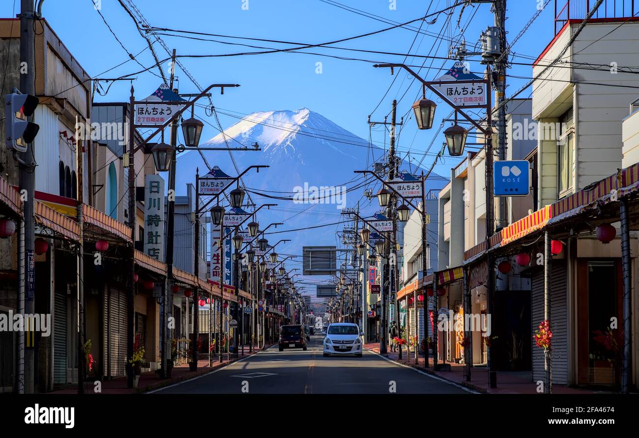 Yamanashi, Japan - November 17 2020: Morning view of Mount Fuji from a street in the city of Fujiyoshida under a clear blue sky Stock Photo