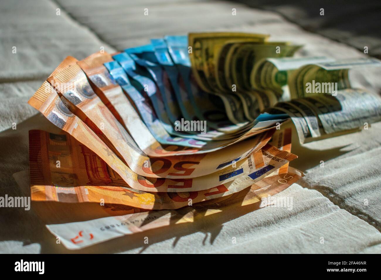 Money / Cash: dollar and euro bills. Stock Photo