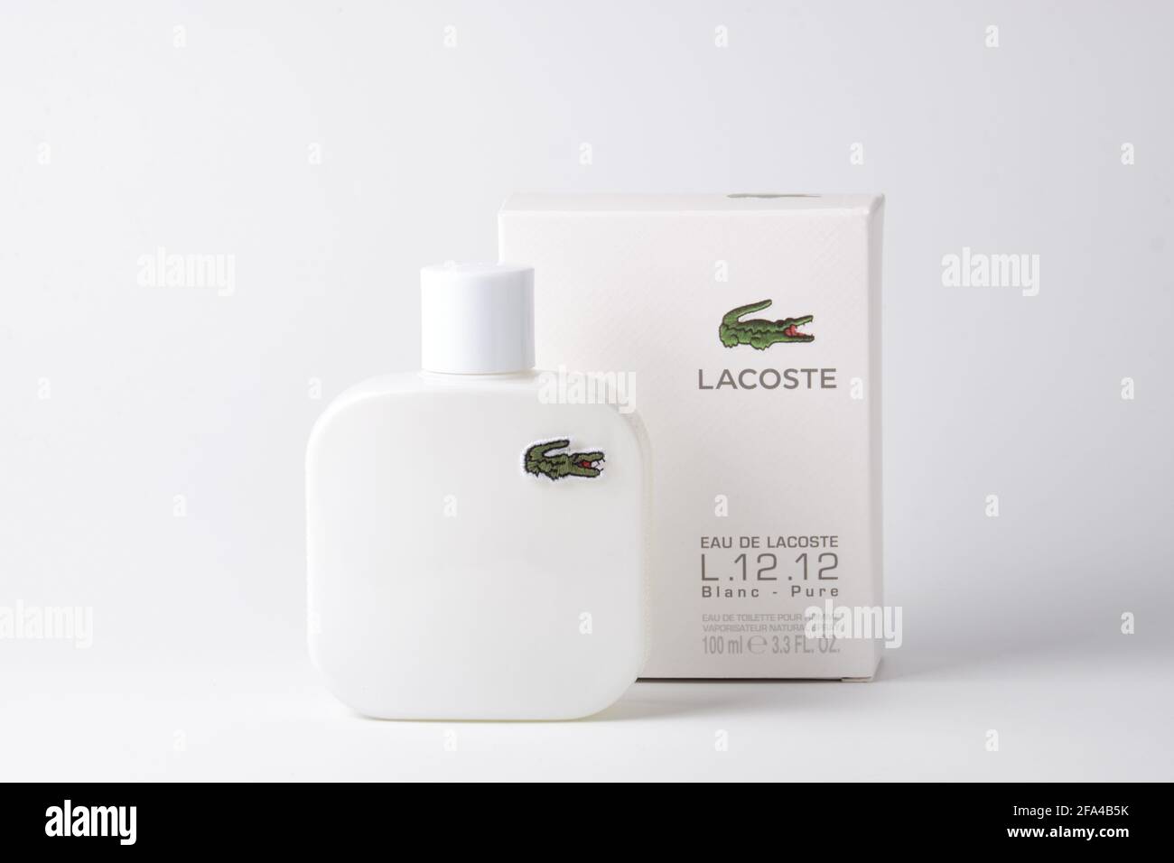 Eau De Lacoste L.12.12 Blanc against white background Stock Photo -