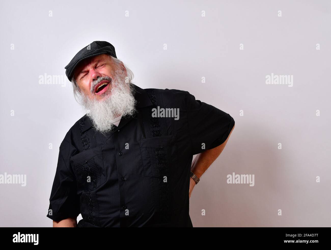 Senior man suffering from severe back pain Stock Photo