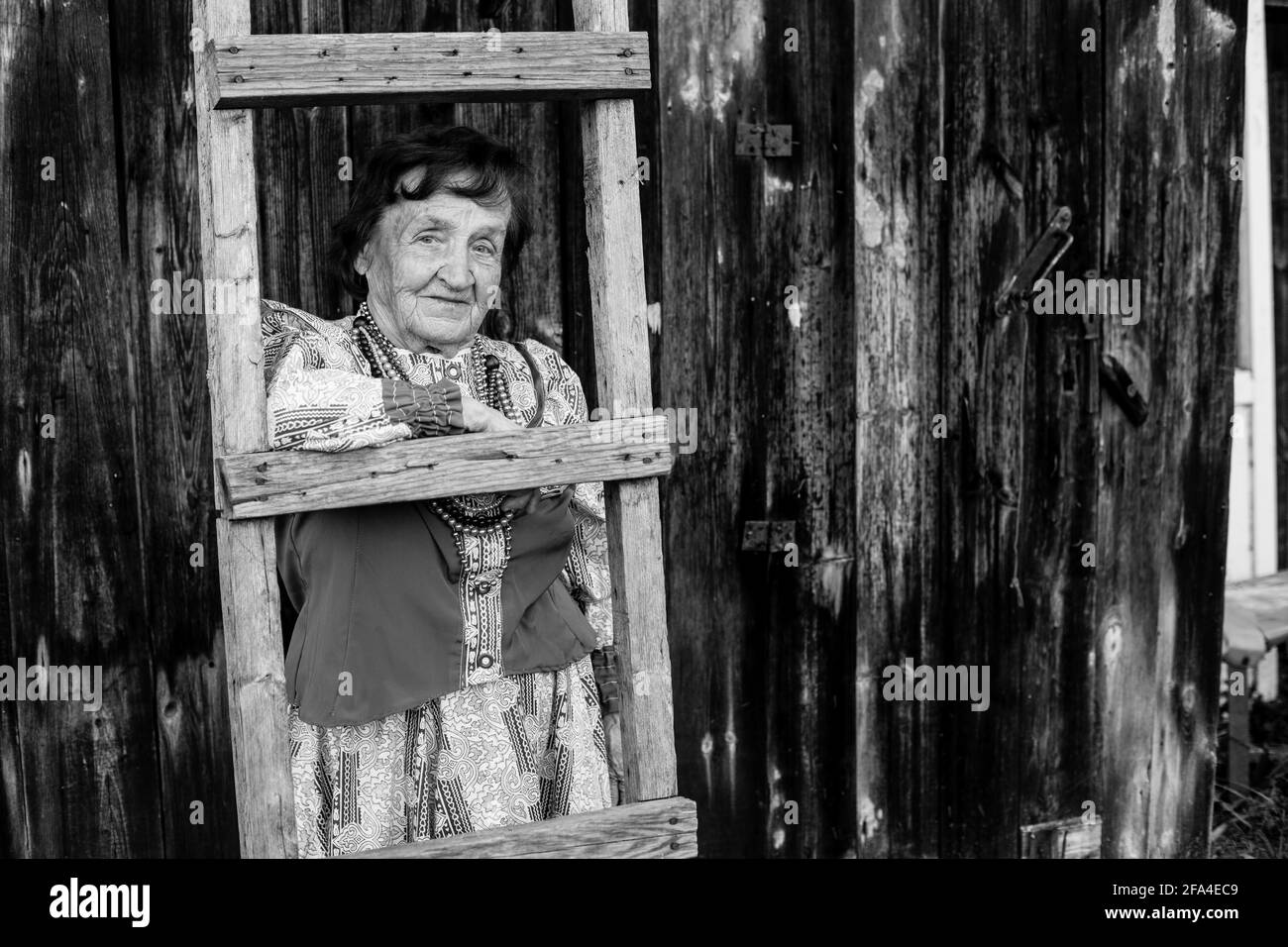Portrait of old woman in the village. Black and white photo Stock Photo ...