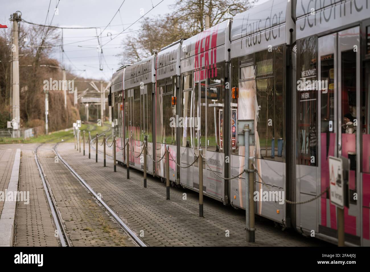Freiburg im Breisgau, Germany - December 25, 2014: One of the trams ( strassenbahn, in german ) that crosses the Lehen village in Freiburg im Breisgau Stock Photo