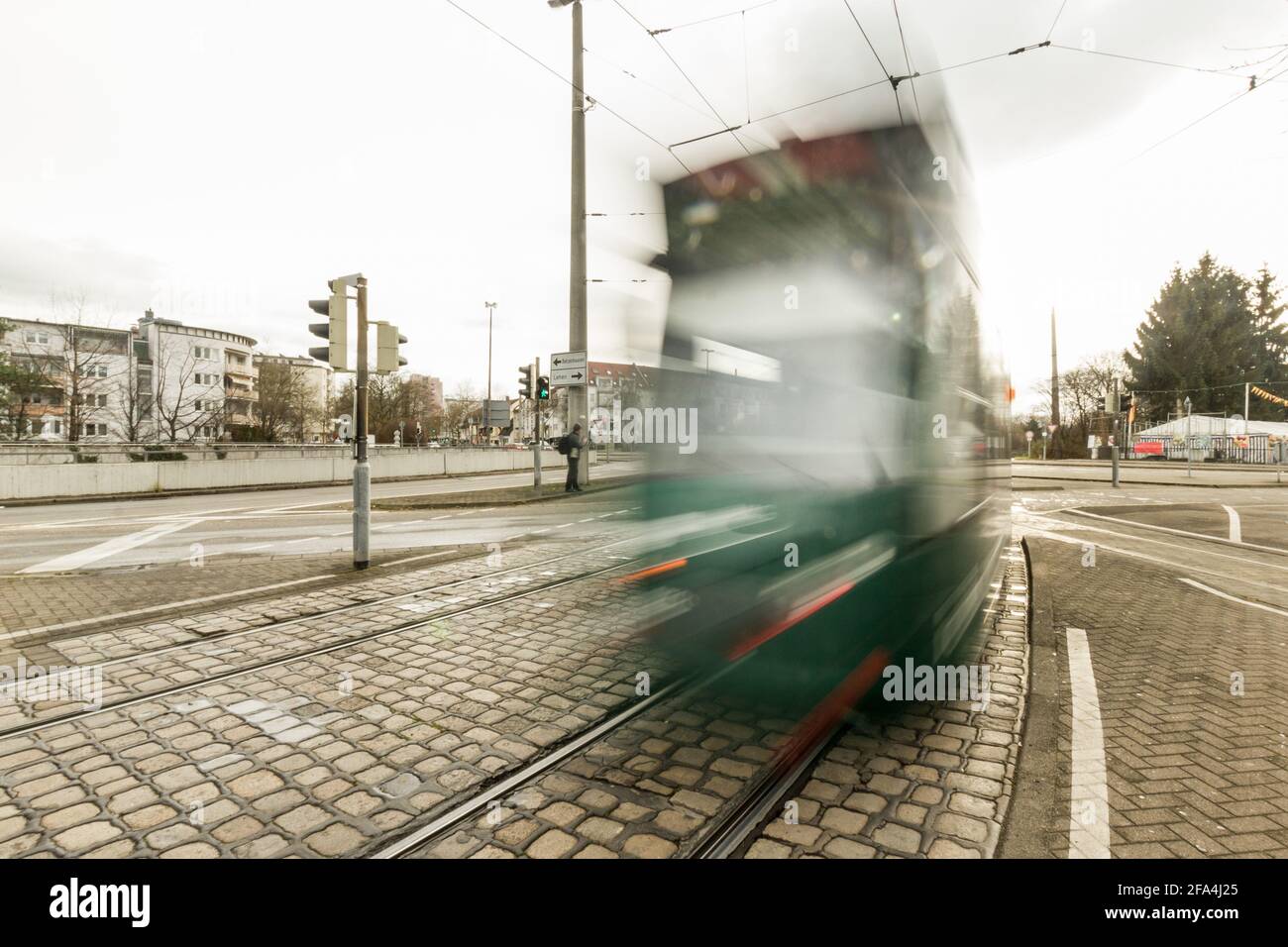 Freiburg im Breisgau, Germany - December 25, 2014: One of the trams ( strassenbahn, in german ) that crosses the Lehen village in Freiburg im Breisgau Stock Photo