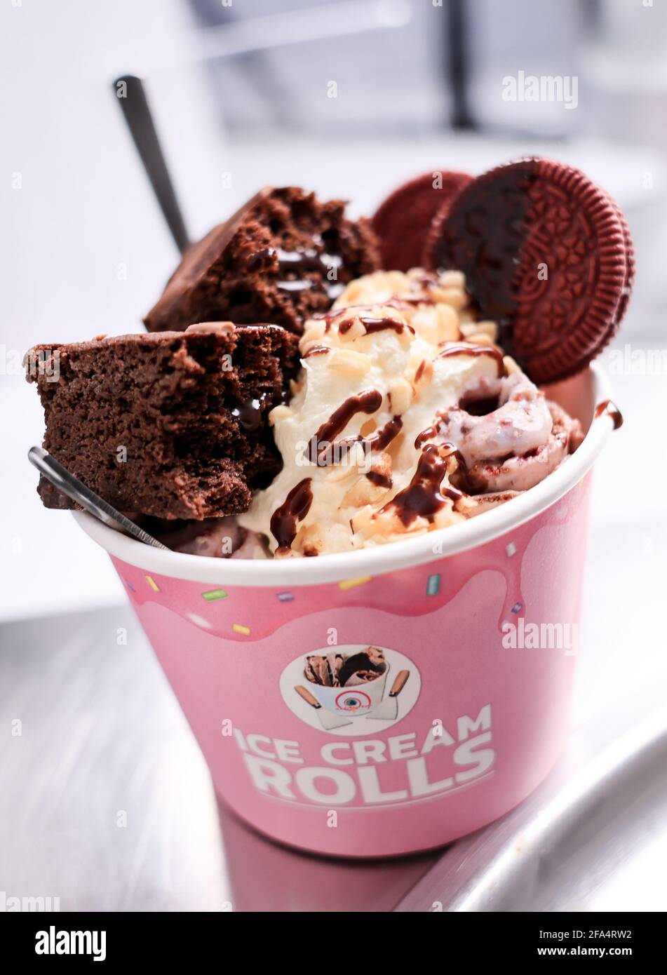 Hamburg, Germany. 19th Apr, 2021. A brownie & Oreo ice cream creation  stands on the frosting plate in the studio of Youtuber Gil Grobe. With his  unusual ice cream creations on the