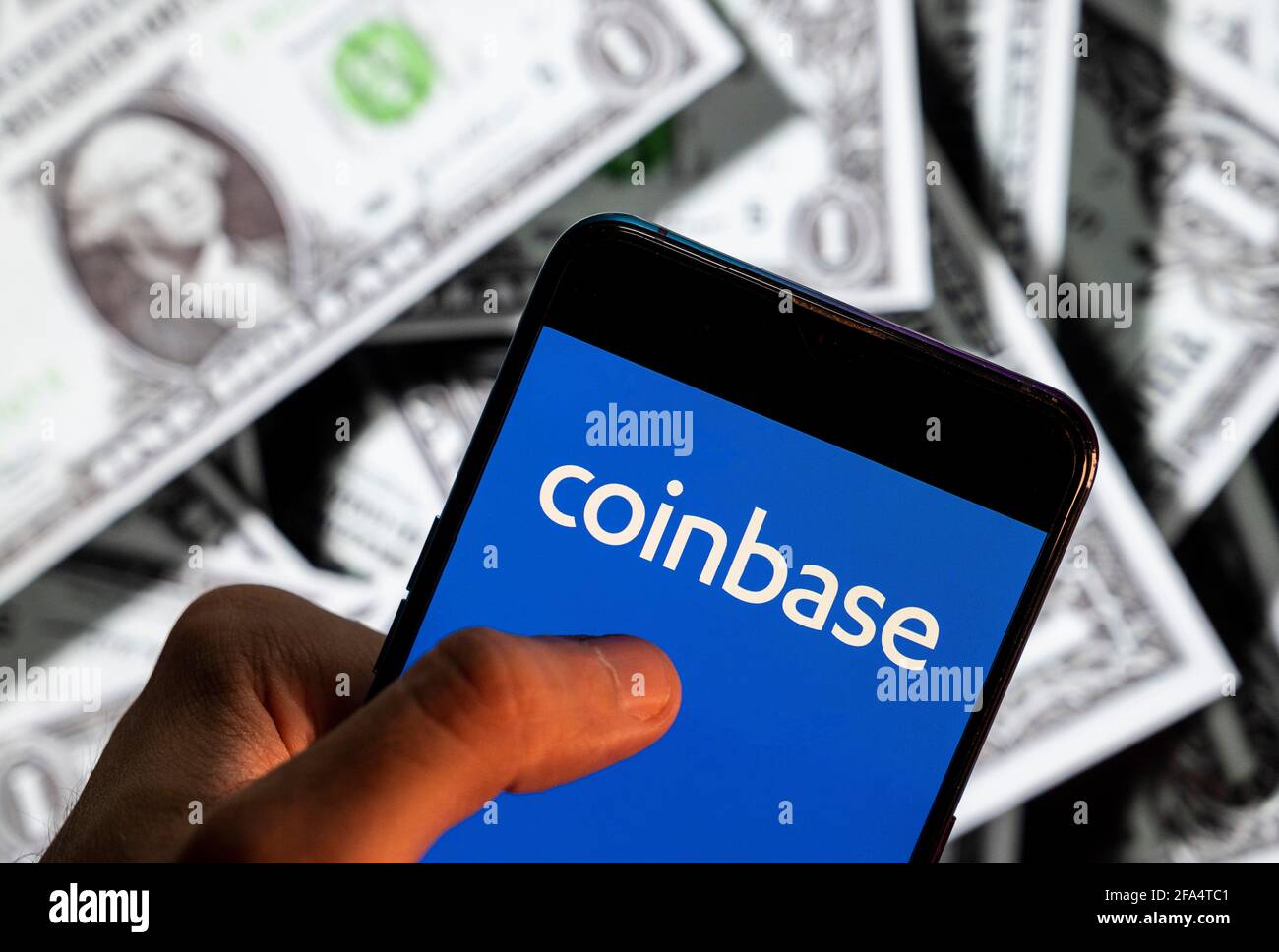 In this photo illustration the online platform for buying, selling,  transferring, and sell cryptocurrency Coinbase logo seen on an Android  mobile device screen with the currency of the United States dollar icon, $