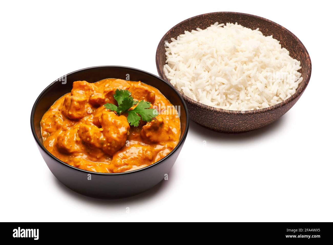 Traditional Chicken Curry and a bowl of boiled rice isolated on white  background with clipping path embedded Stock Photo - Alamy