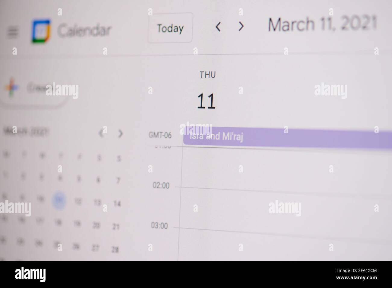 New york, USA - February 17, 2021: Isra and Miraj 11 of March on google calendar on laptop screen close up view. Stock Photo