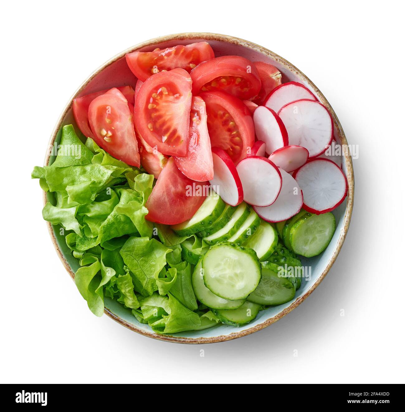 bowl of fresh sliced vegetables isolated on white background, top view ...