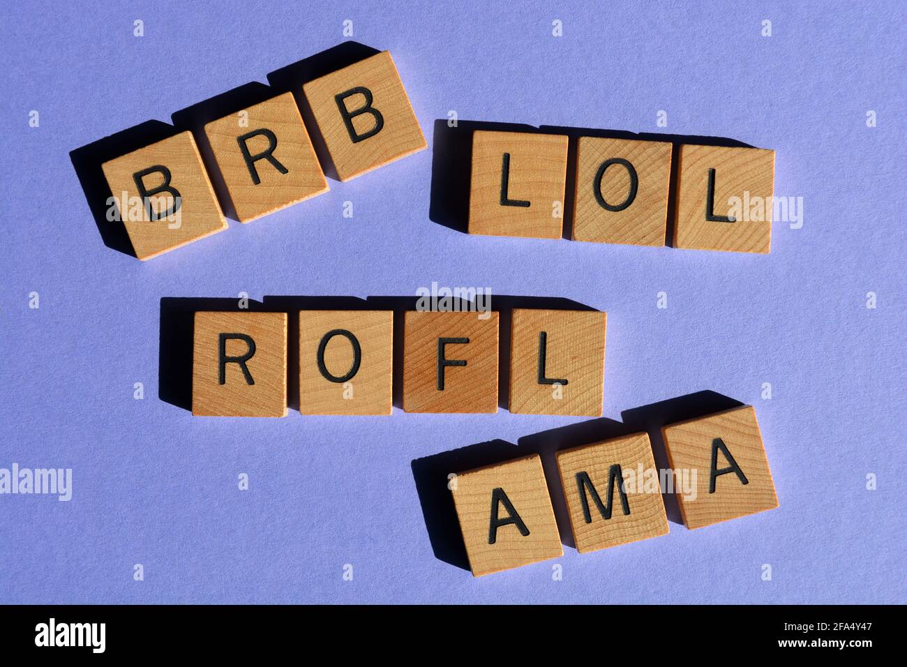 Acronyms used in text speak including BRB, LOL, ROFL and AMA,  or Ask Me Anything Stock Photo