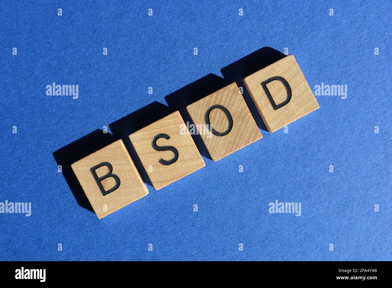 BSOD, acronym for Blue Screen of Death, letters isolated on blue background Stock Photo