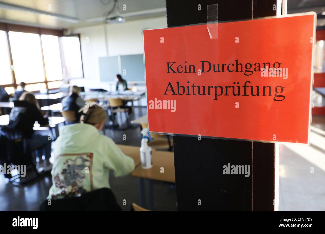 Kaarst, Germany. 23rd Apr, 2021. A sign with the inscription 'No passage - Abitur exams' hangs in the Albert-Einstein-Gymnasium. In North Rhine-Westphalia, the Abitur exams are starting for about 90,000 students under aggravated pandemic conditions. (To dpa: 'Abiprüfungen unter erschwerten Pandemie-Bedingungen starten') Credit: Oliver Berg/dpa/Alamy Live News Stock Photo