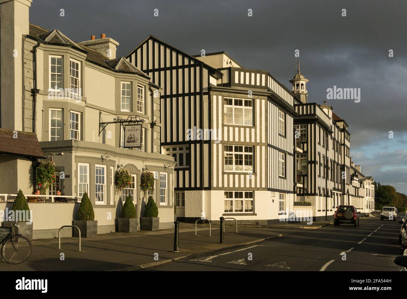 Stormy skies over buildings in the village of Parkgate, Neston, Wirral, UK; it is situated overlooking the Dee Estuary. Stock Photo