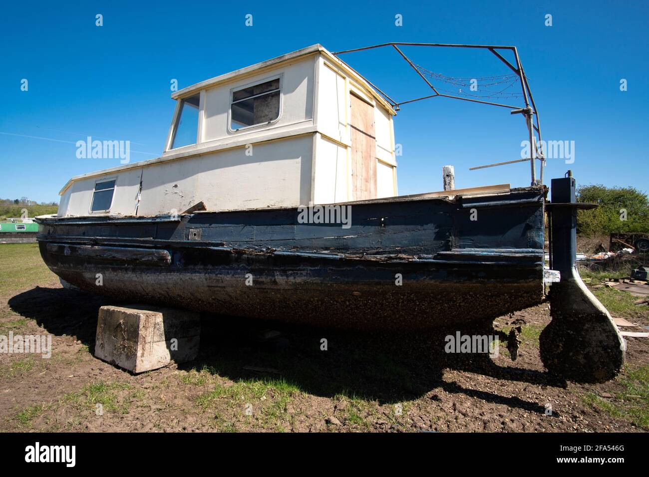 Old sea boat in a salvage yard Stock Photo Alamy