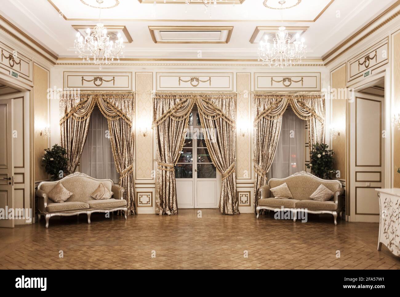 Luxury vintage interior with an aristocratic style. A pompous room with  windows Stock Photo - Alamy