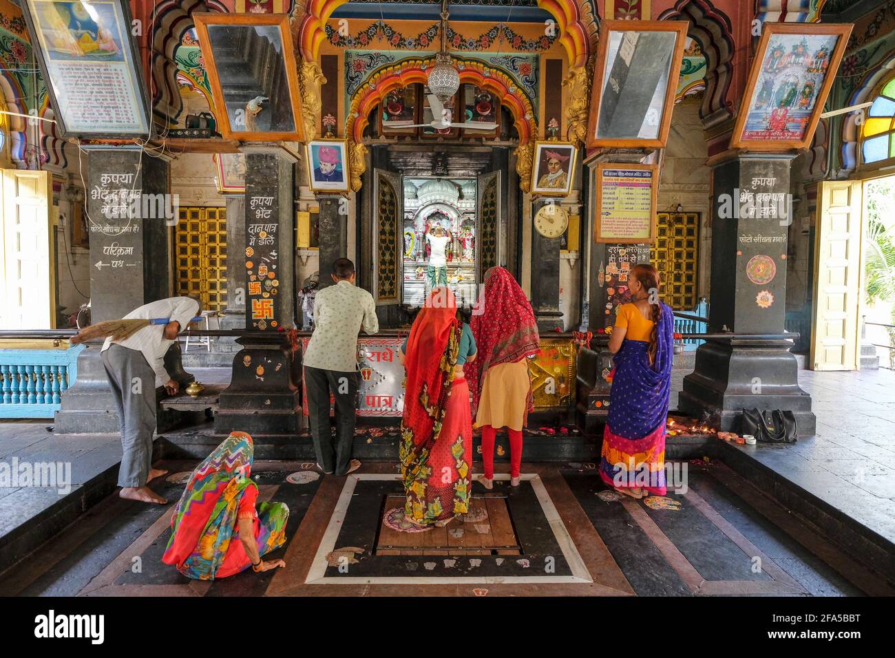Ujjain, India - March 2021: People making offerings at the Gopal Temple in Ujjain on March 24, 2021 in Madhya Pradesh, India. Stock Photo