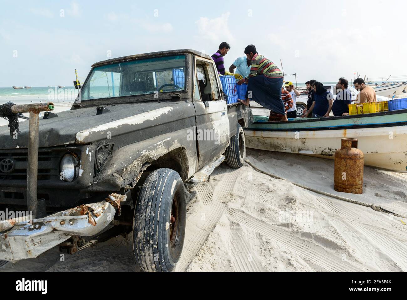 Fishing activities on the beach near the village Al-Khalufa, Oman