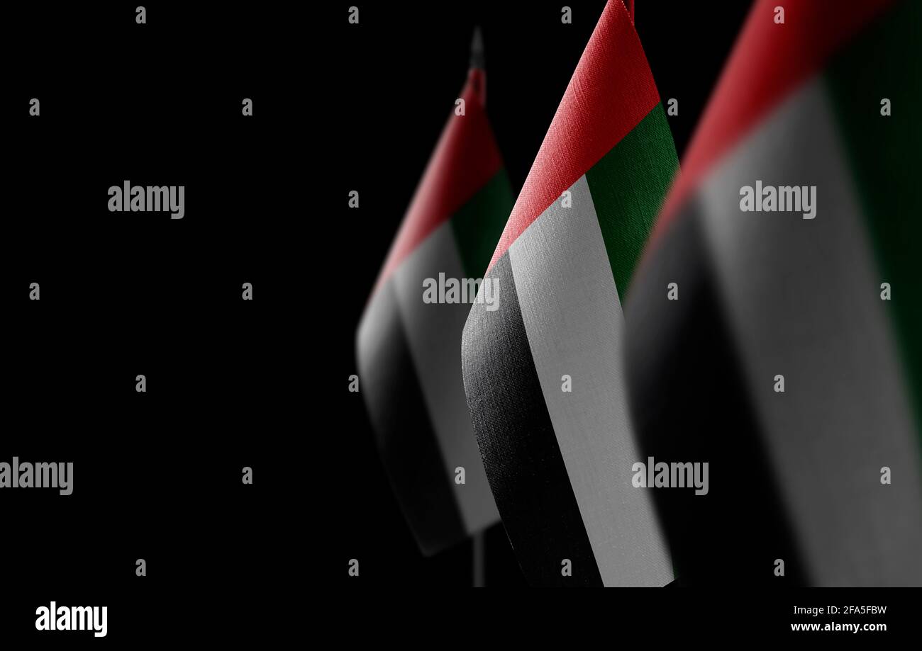 Small national flags of the United Arab Emirates on a black background Stock Photo