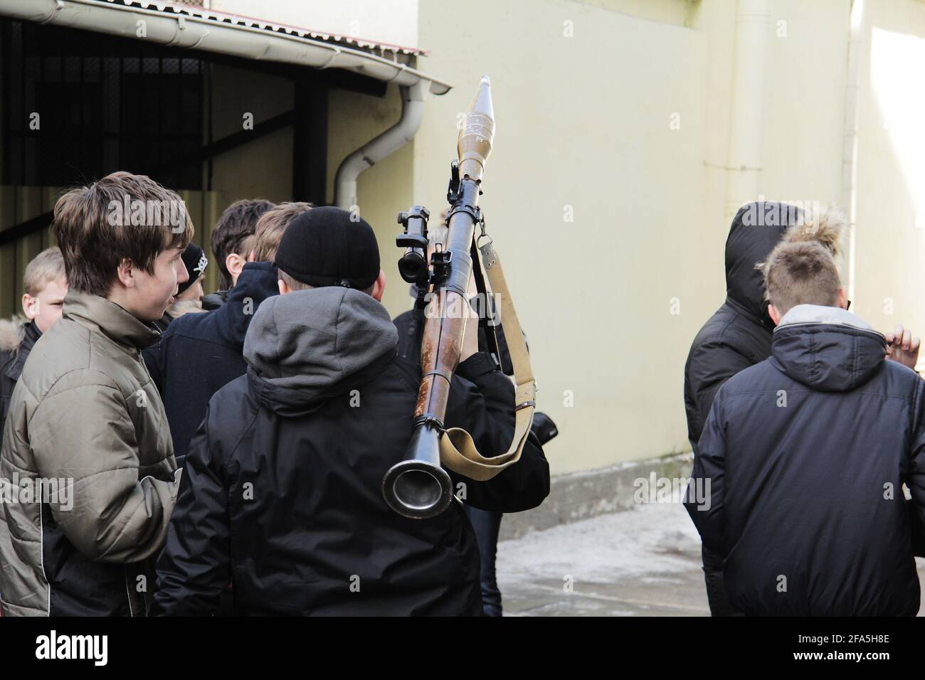 Saint-Petersburg, Russia, Aleksandr Kirillov - 04042013: 'Recruiting station. Children are holding real weapons' Stock Photo