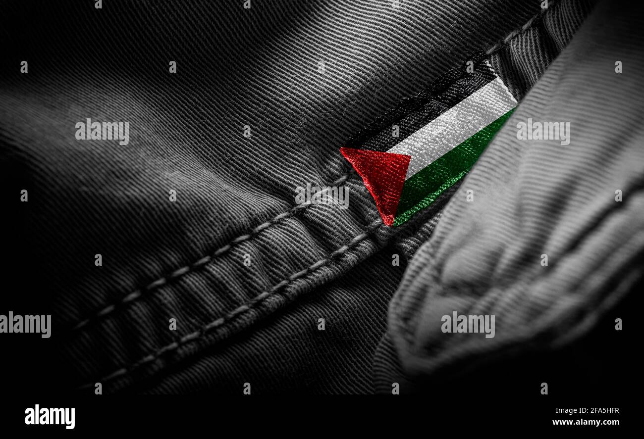 Tag on dark clothing in the form of the flag of the Palestine Stock Photo